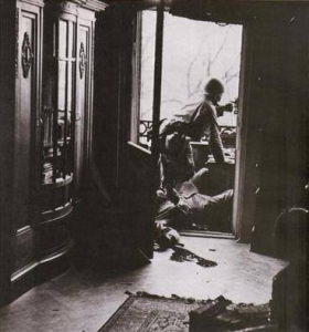 Photos by Robert Capa, American soldier killed by a German sniper.